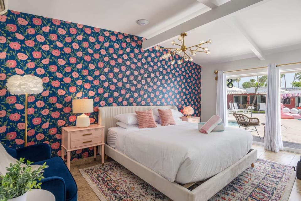 Floral wallpaper and soft lighting create a dreamy retreat in the heart of Palm Springs. Relax in comfort and embrace the boutique charm of The Muse Hotel.