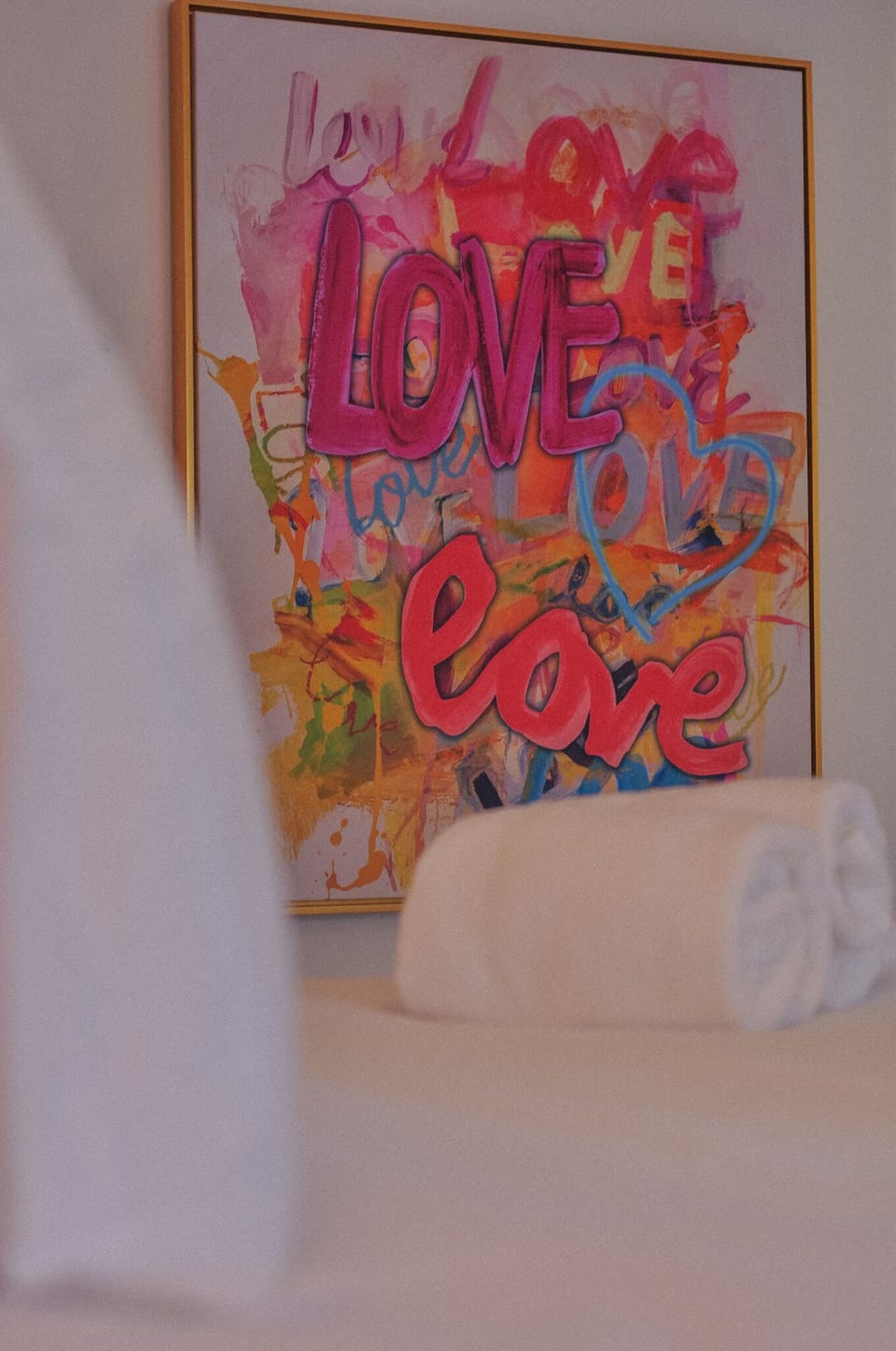 Bold Art, Dreamy Vibes. Our colorful sanctuary in the Barbie Suite sparks creativity and sets the perfect romantic mood. Your artistic Palm Springs escape awaits!