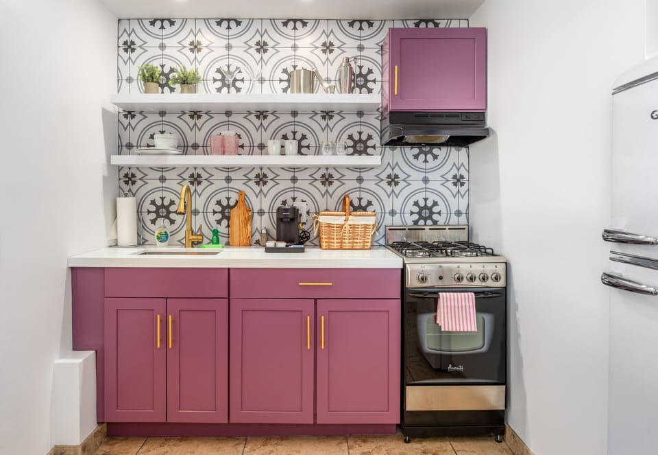 Wake up to color and warmth in this vibrant Palm Springs kitchen. Ideal for coffee, breakfast, and morning light.