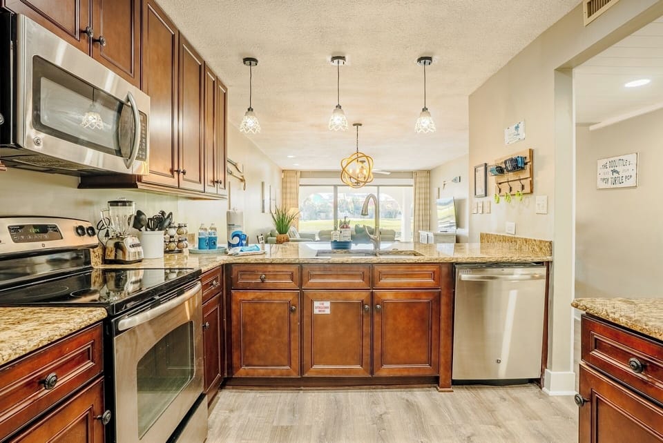 Large kitchen overlooking the dining and living areas