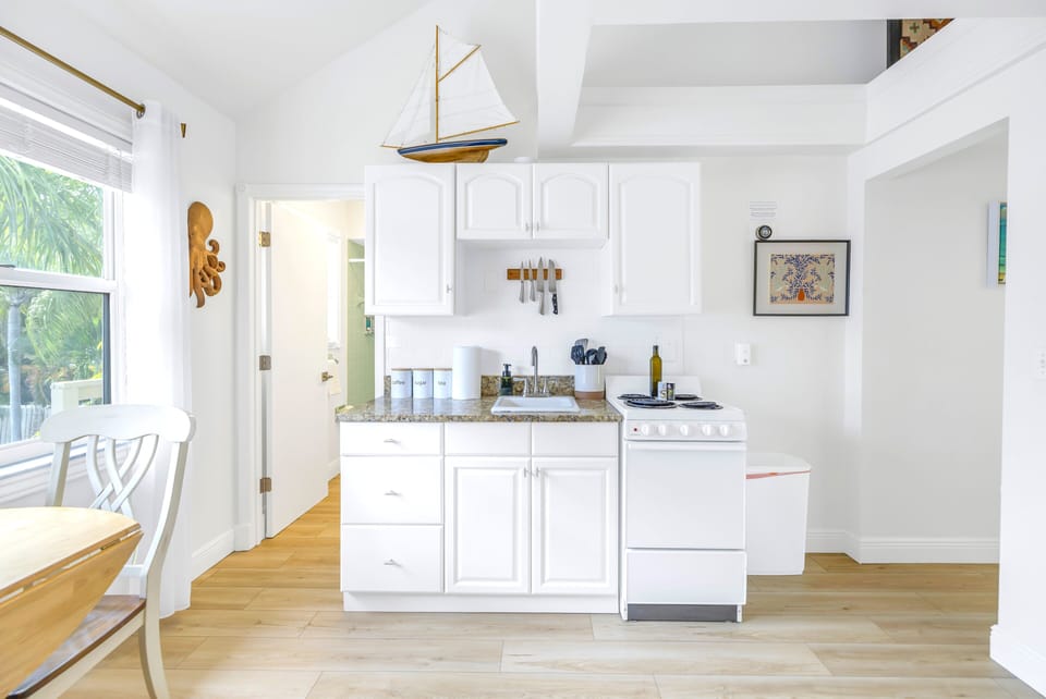 Spacious one-bedroom unit with a fully equipped kitchen at The Coral Cabanas, Siesta Key.