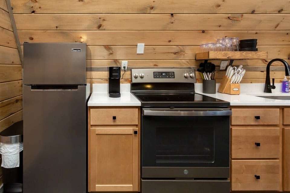 Kitchen Complete With Quartz Countertops And Stainless Steel Appliances!