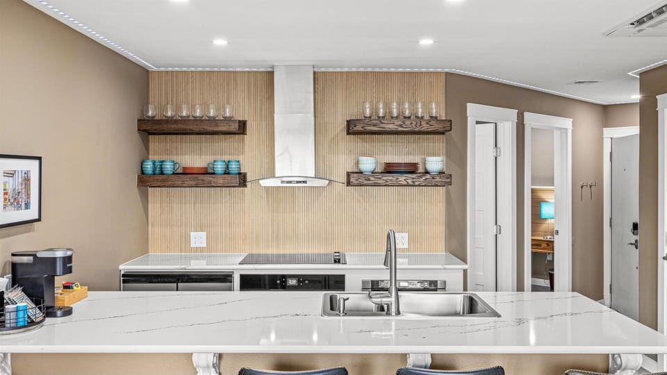 Updated chefs kitchen with open shelving.