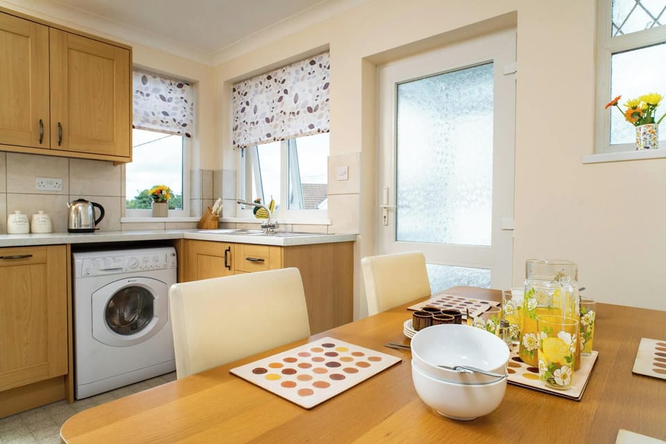 Kitchen and dining area at 2 Rock Cottage