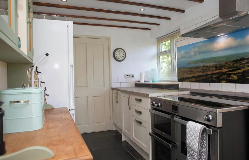 Kitchen with electric range cooker
