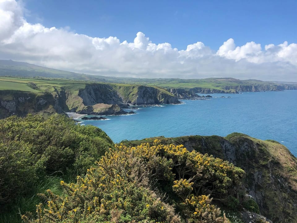 Views of the coastline of Dinas Head