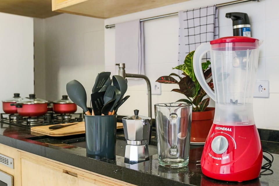 Apartment | Private kitchen | Microwave, blender, cookware/dishes/utensils, cleaning supplies