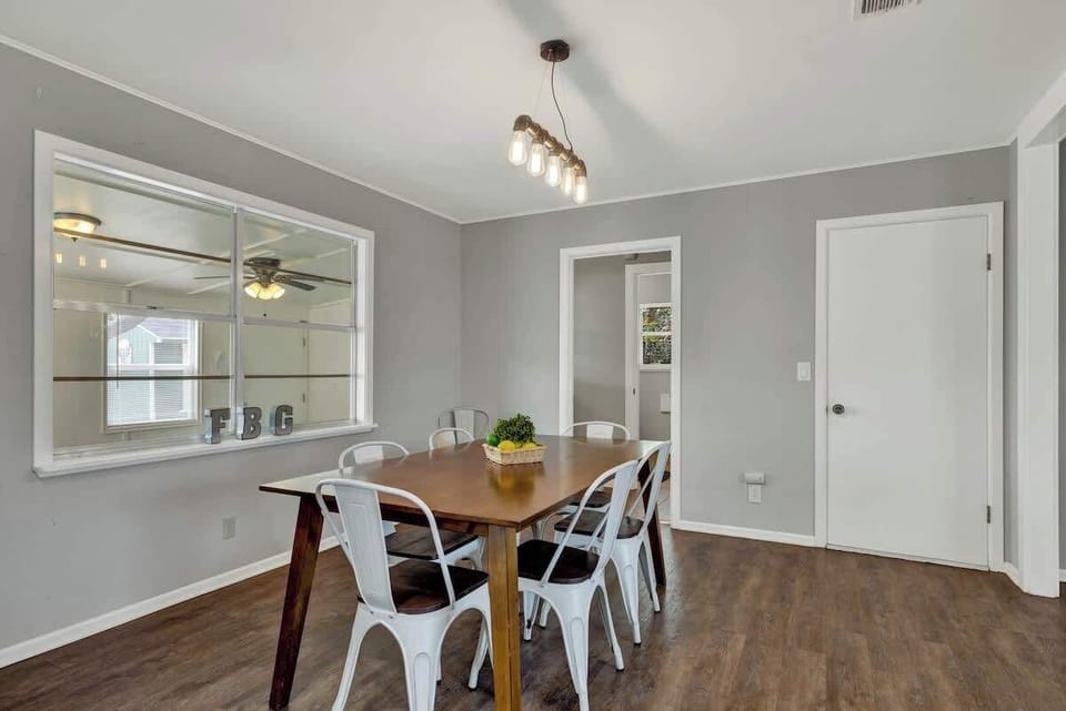 Large dining table can seat six.