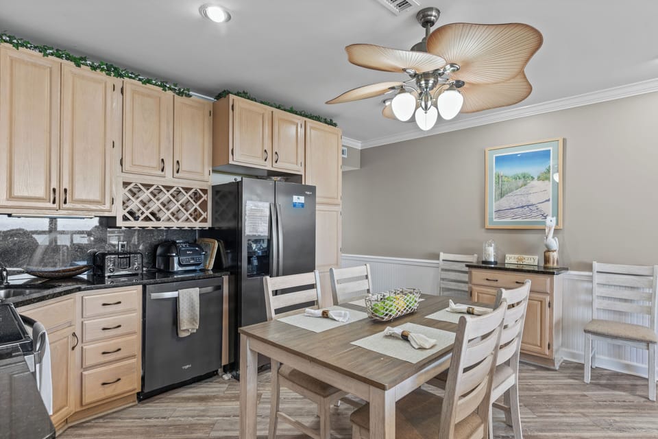 Enjoy a Home Cooked Meal at the Dining Table, comfortably seating a Family of 6.