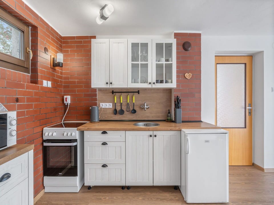 Kitchen, Cabinetry, Major Appliance, Wood, Furniture, Countertop, Kitchen Appliance, Drawer, Cupboard, Interior Design