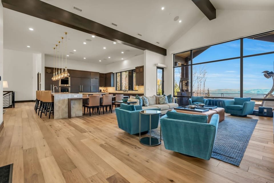 Living Space with a Sofa, Accent Chairs, Coffee Tables, Breakfast Bar and Chairs