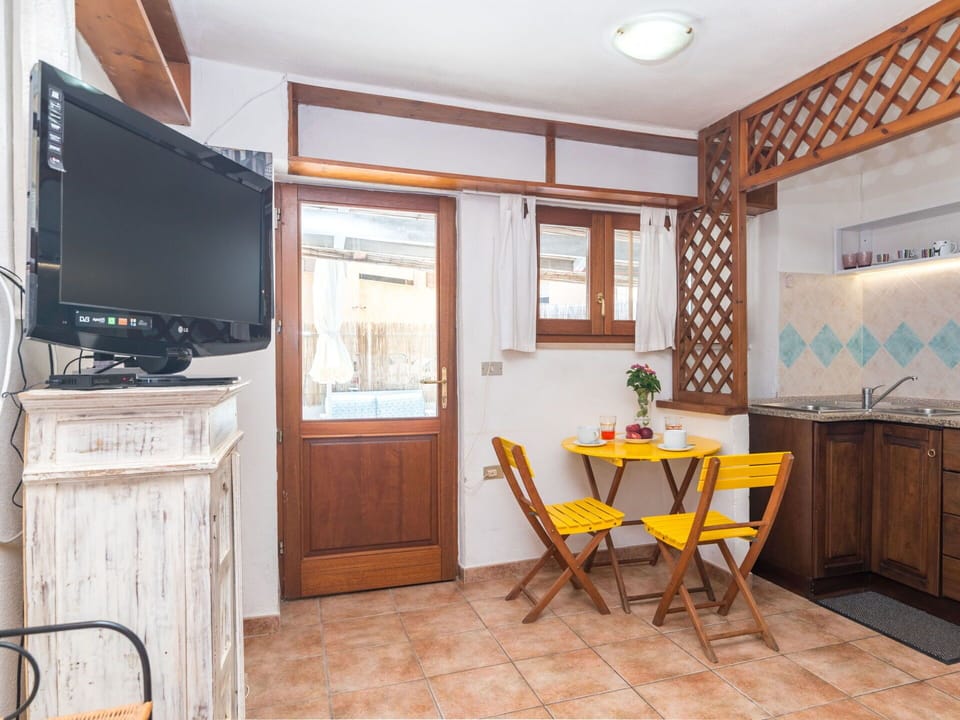 Cabinetry, Furniture, Property, Table, Building, Window, Wood, Chair, Kitchen, Drawer