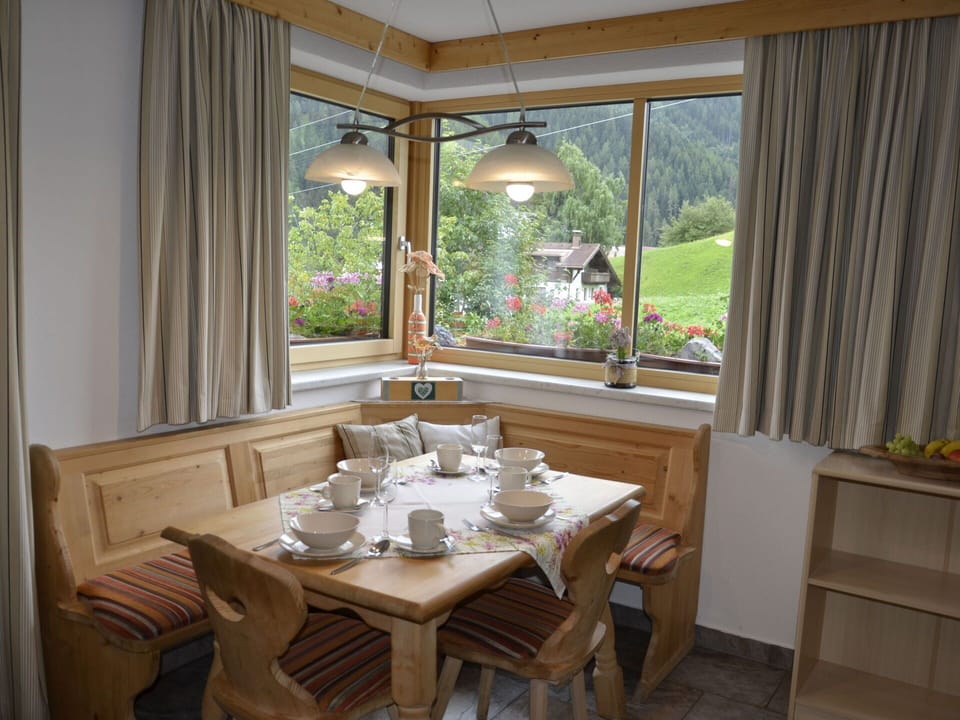 Furniture, Plant, Window, Table, Curtain, Wood, Interior Design, Shade, Architecture, Tableware
