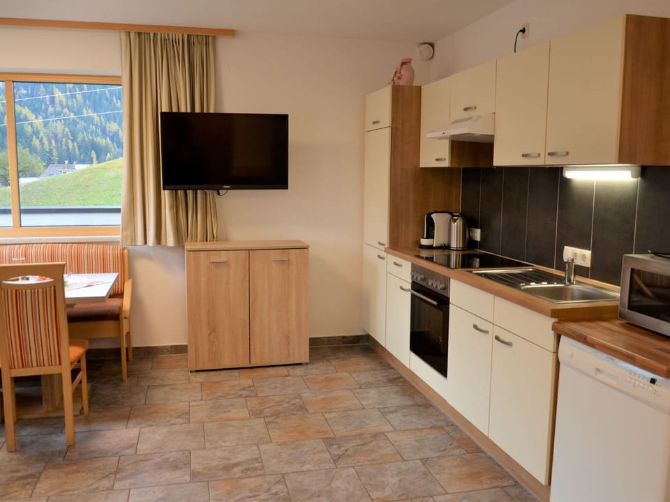 Cabinetry, Countertop, Property, Furniture, Window, Kitchen Appliance, Sink, Home Appliance, Building, Kitchen