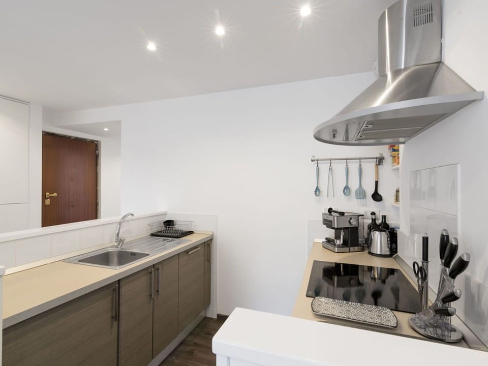 Cabinetry, Property, Building, White, Sink, Countertop, Kitchen Sink, Lighting, Interior Design, Kitchen
