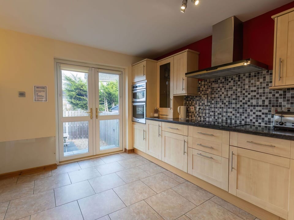 Cabinetry, Property, Countertop, Tap, Wood, Lighting, Interior Design, Building, Drawer, Flooring