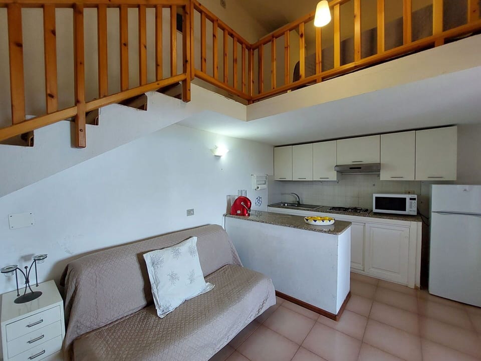Furniture, Property, Cabinetry, Countertop, Building, Wood, Interior Design, Kitchen Stove, Comfort