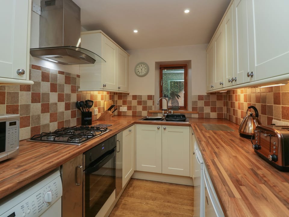 Fridge, dishwasher, electric kettle, cookware/dishes/utensils