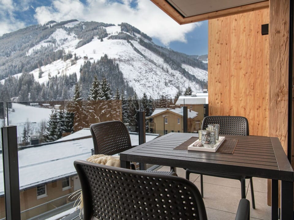 Cloud, Sky, Table, Furniture, Property, Snow, Building, Mountain, Window, Tree