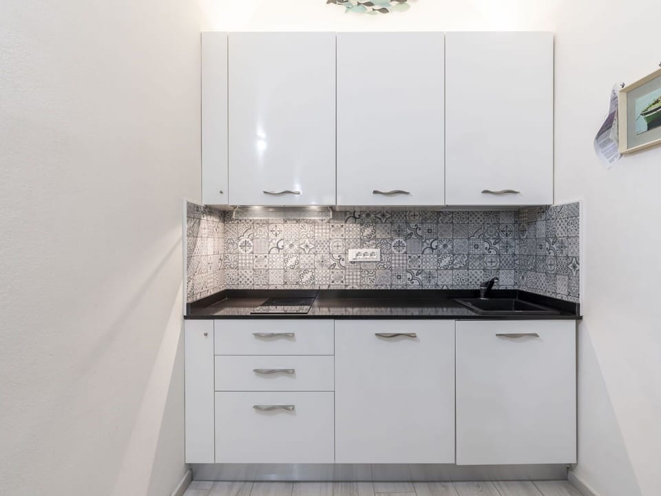 Cabinetry, Furniture, Kitchen Appliance, Countertop, Kitchen Stove, Drawer, Kitchen, Wood, Building