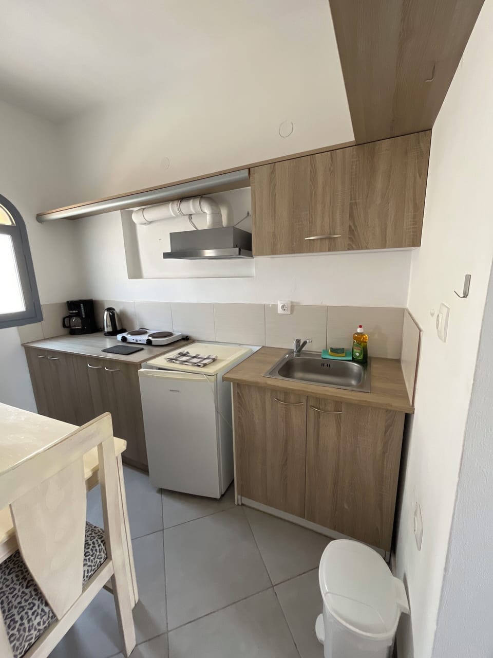 Deluxe Quadruple Room | Private kitchen | Fridge