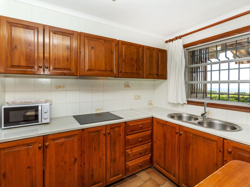 Cabinetry, Wood, Kitchen, Flooring, Interior Design, Furniture, Drawer, Countertop, Cupboard, Floor