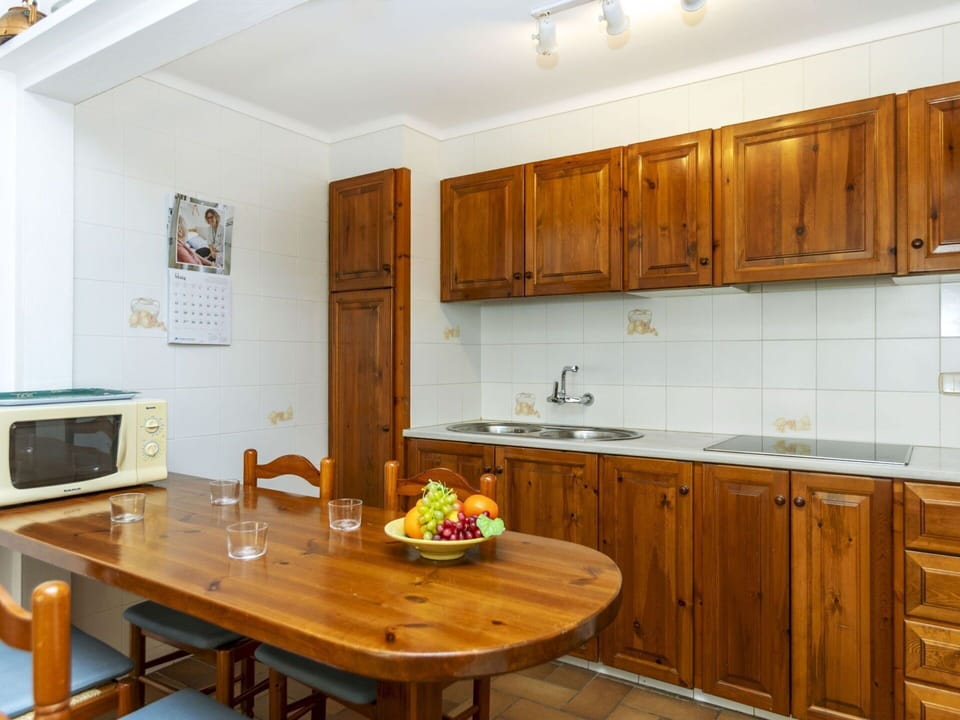 Furniture, Cabinetry, Wood, Interior Design, Flooring, Countertop, Kitchen, Cupboard, Room, Ceiling