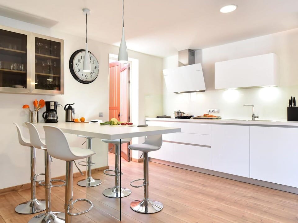 Property, Furniture, Cabinetry, Table, Countertop, Wood, Kitchen, Chair, Flooring, Interior Design