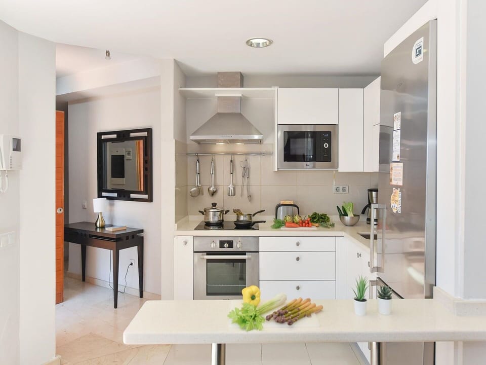 Cabinetry, Property, Furniture, Countertop, Table, Sink, Home Appliance, Interior Design, Kitchen Stove, Floor