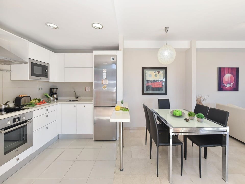 Furniture, Cabinetry, Countertop, Wood, Kitchen Stove, Table, Building, Kitchen Appliance, Sink, Interior Design
