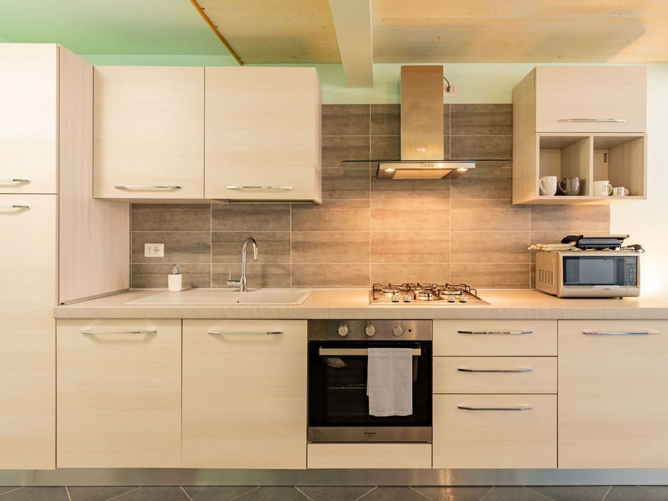 Cabinetry, Countertop, Tap, Furniture, Sink, Property, Building, Kitchen, Wood, Kitchen Stove