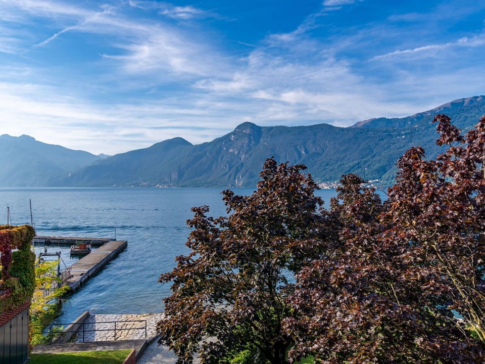 Sky, Building, Property, Table, Furniture, Cloud, Mountain, Interior Design, Outdoor Furniture, Wood