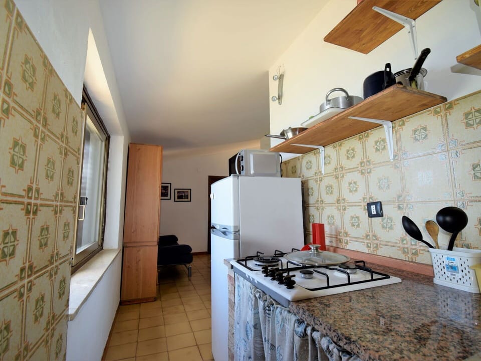 Property, Interior Design, Floor, Wood, Cabinetry, Flooring, Kitchen, Building, Gas Stove