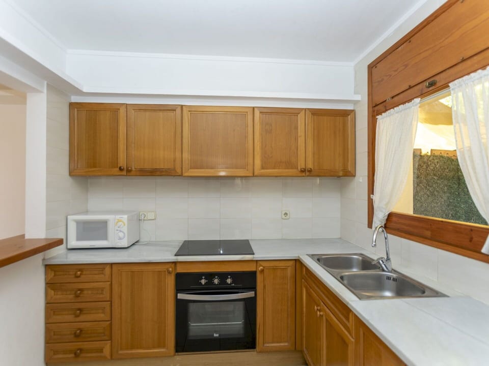 Kitchen, Cabinetry, Countertop, Kitchen Appliance, Furniture, Interior Design, Flooring, Major Appliance, Wood, Ceiling
