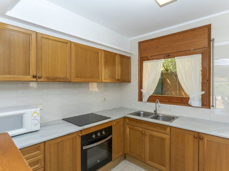 Kitchen, Cabinetry, Kitchen Appliance, Countertop, Flooring, Major Appliance, Wood, Interior Design, Furniture, Floor