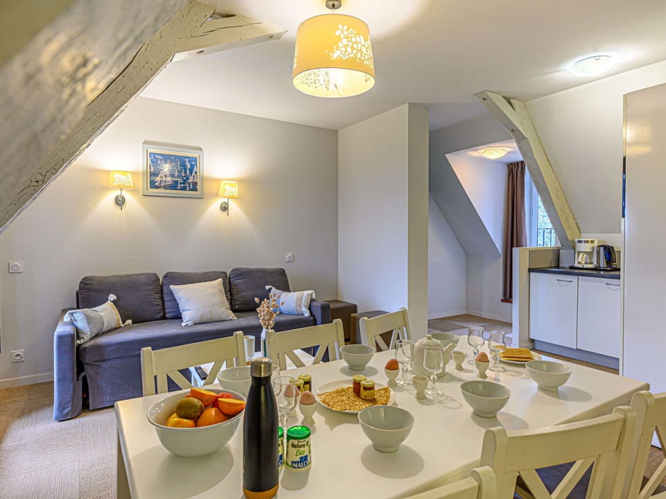 Table, Food, Property, Tableware, Furniture, Interior Design, Orange, Lighting, Couch, Chair