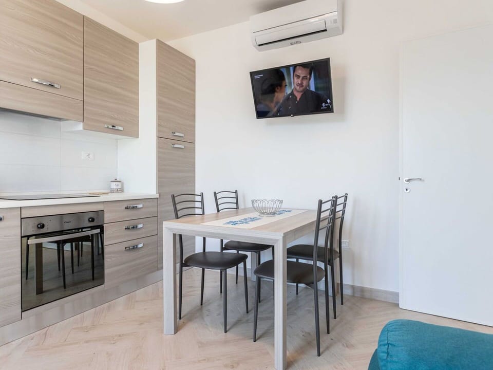 Table, Furniture, Cabinetry, Chair, Building, Wood, Lighting, Interior Design, Kitchen & Dining Room Table, Countertop