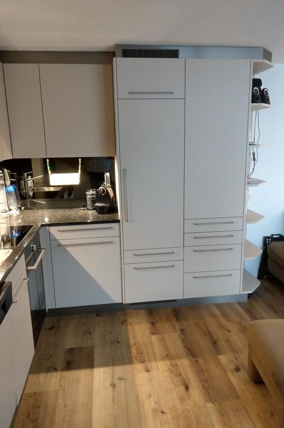 Cabinetry, Countertop, Wood, Drawer, Flooring, Kitchen Appliance, Floor, Wood Stain, Laminate Flooring