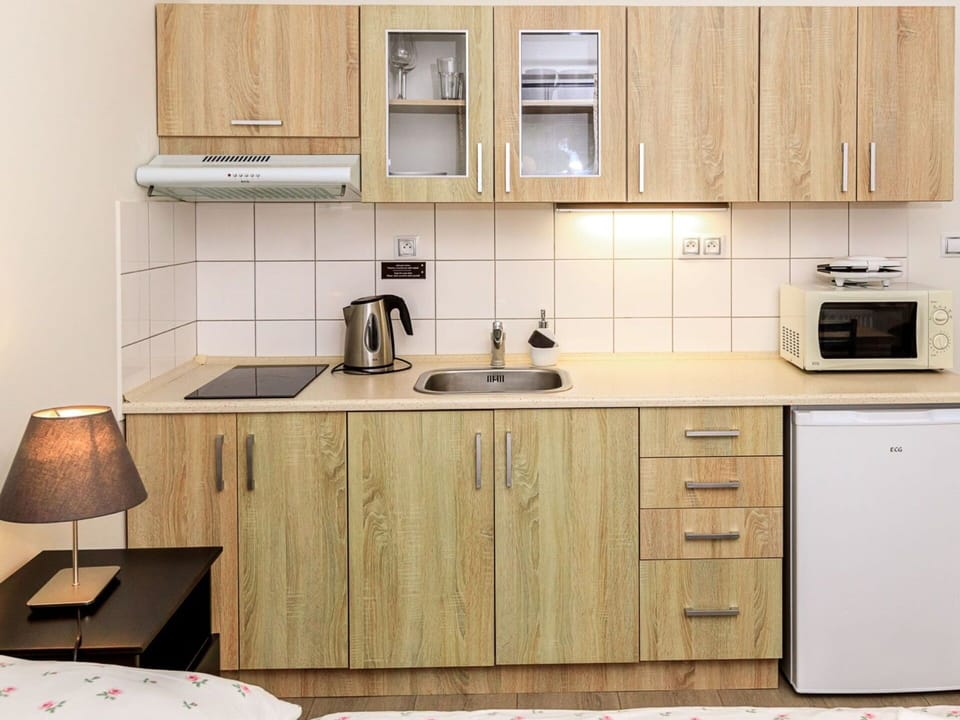 Countertop, Cabinetry, Kitchen Sink, Property, Sink, Kitchen, Kitchen Stove, Drawer, Tap, Wood