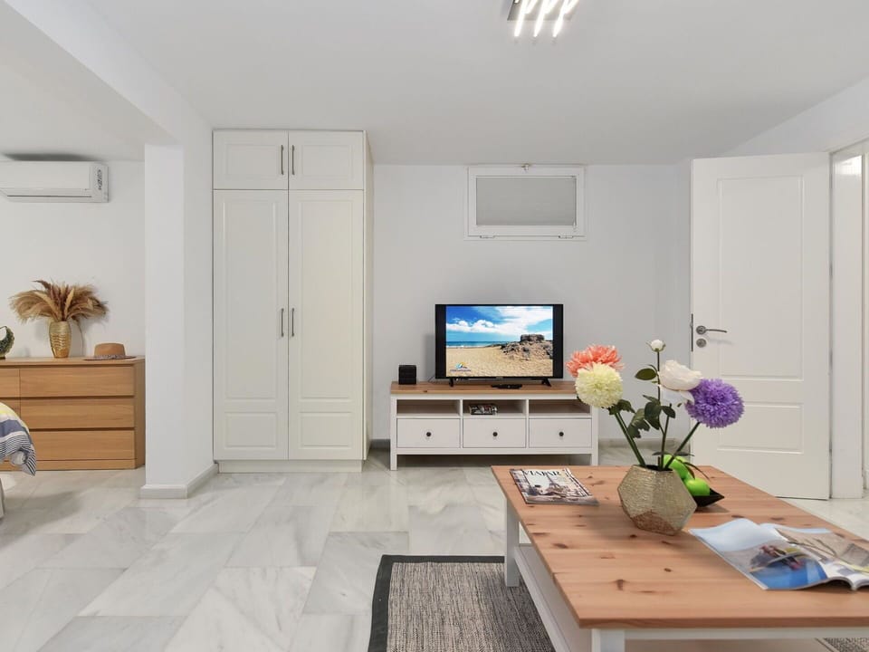 Furniture, Interior Design, Flooring, Floor, Wood, Table, Ceiling, Room, Couch, Living Room