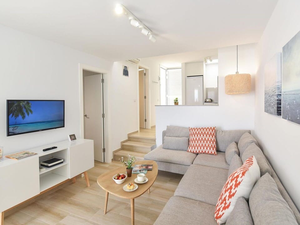 Couch, Furniture, Property, Table, Comfort, Picture Frame, Living Room, Interior Design, Lighting, Wood