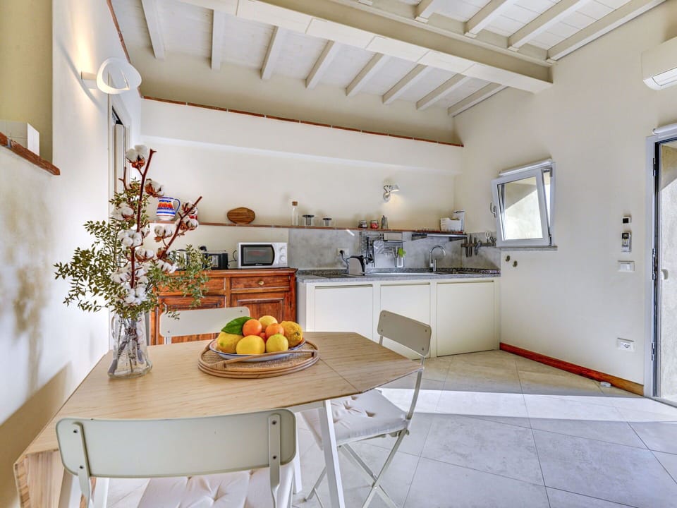 Table, Furniture, Property, Cabinetry, Countertop, Window, Food, Interior Design, Wood, Building