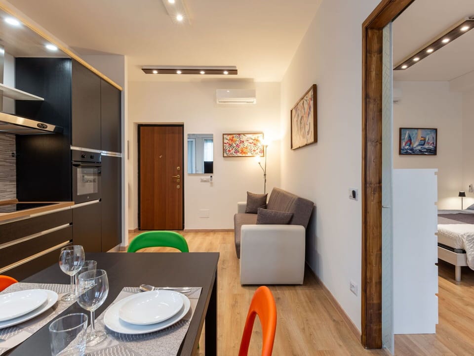 Furniture, Picture Frame, Table, Comfort, Wood, Interior Design, Lighting, Orange, Dishware, Building