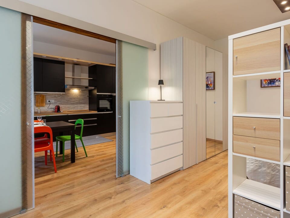 Furniture, Building, Cabinetry, Wood, Hall, Flooring, Floor, Wood Stain, Door