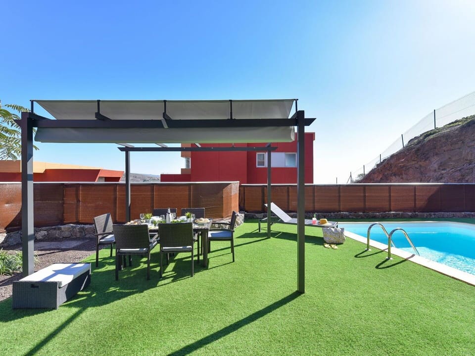 Sky, Building, Plant, Shade, Land Lot, Grass, Leisure, Urban Design, Landscape, House