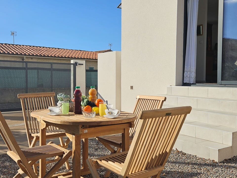 Furniture, Sky, Building, Property, Table, Chair, Window, Wood, Shade, Outdoor Furniture
