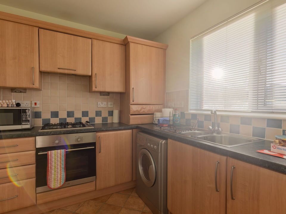 Cabinetry, Countertop, Window, Window Blind, Kitchen Stove, Kitchen Appliance, Wood, Kitchen, Home Appliance, Sink