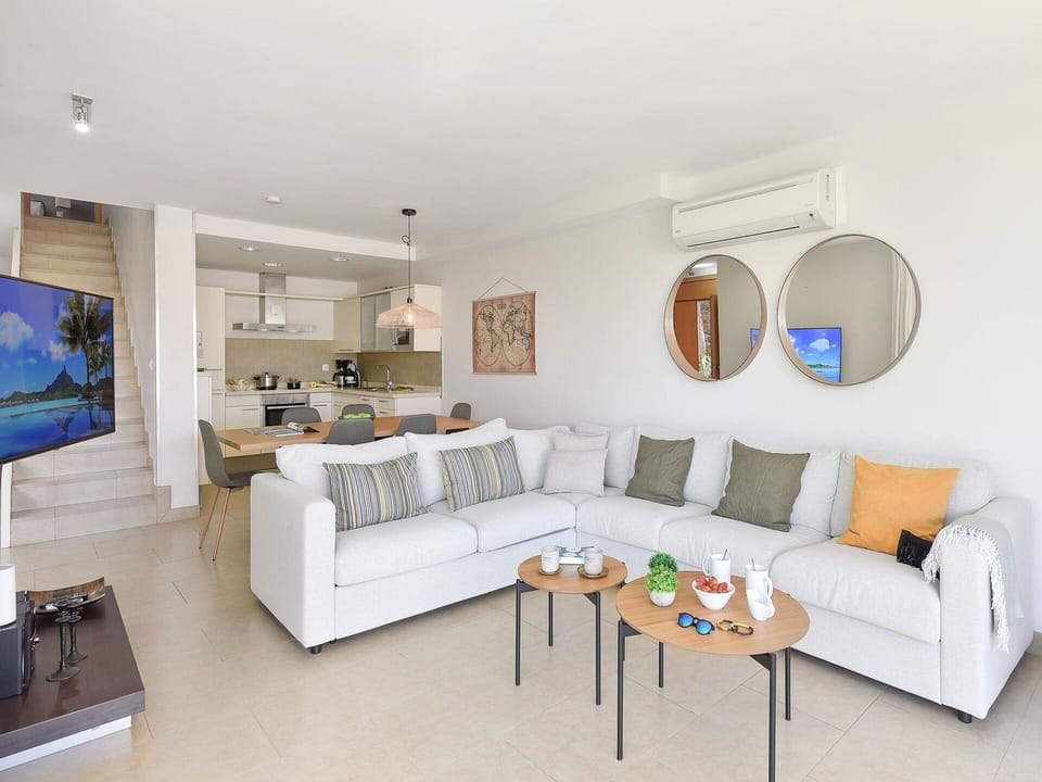 Couch, Furniture, Picture Frame, Table, Interior Design, Living Room, Studio Couch, Shelving, Floor, Shelf