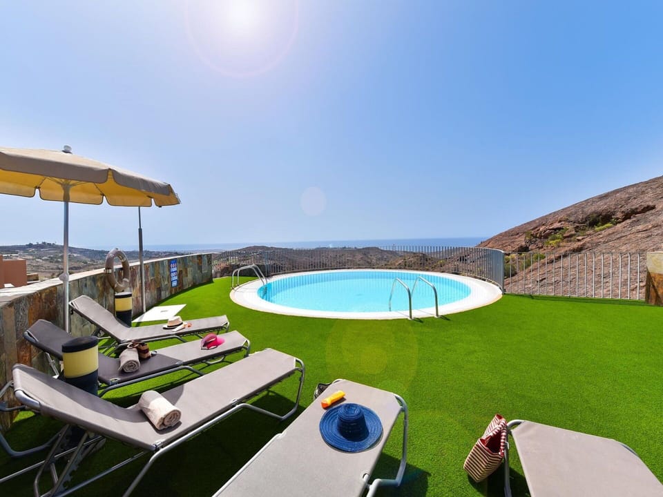 Water, Sky, Property, Building, Swimming Pool, Azure, Shade, Plant, Outdoor Furniture, Body Of Water