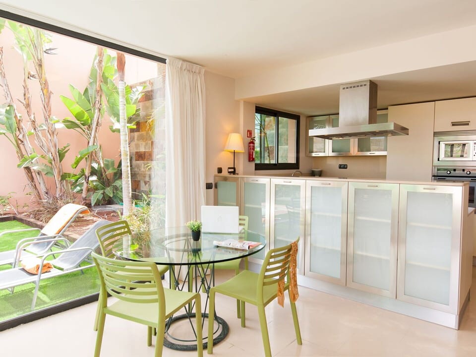 Sky, Property, Furniture, Table, Building, Water, Chair, Wood, Shade, Interior Design